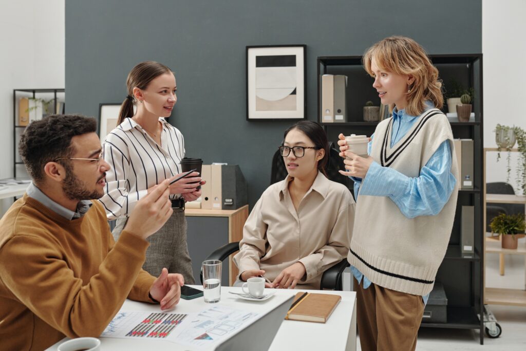 Young professionals working together in a direct sales and marketing company.