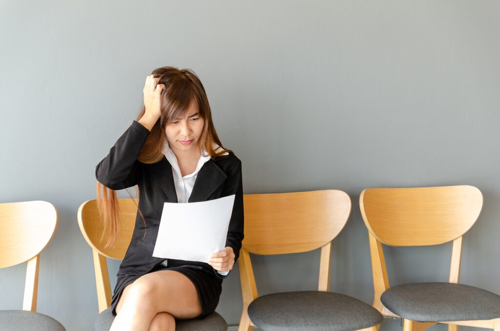 A female applicant worried for her first job interview.